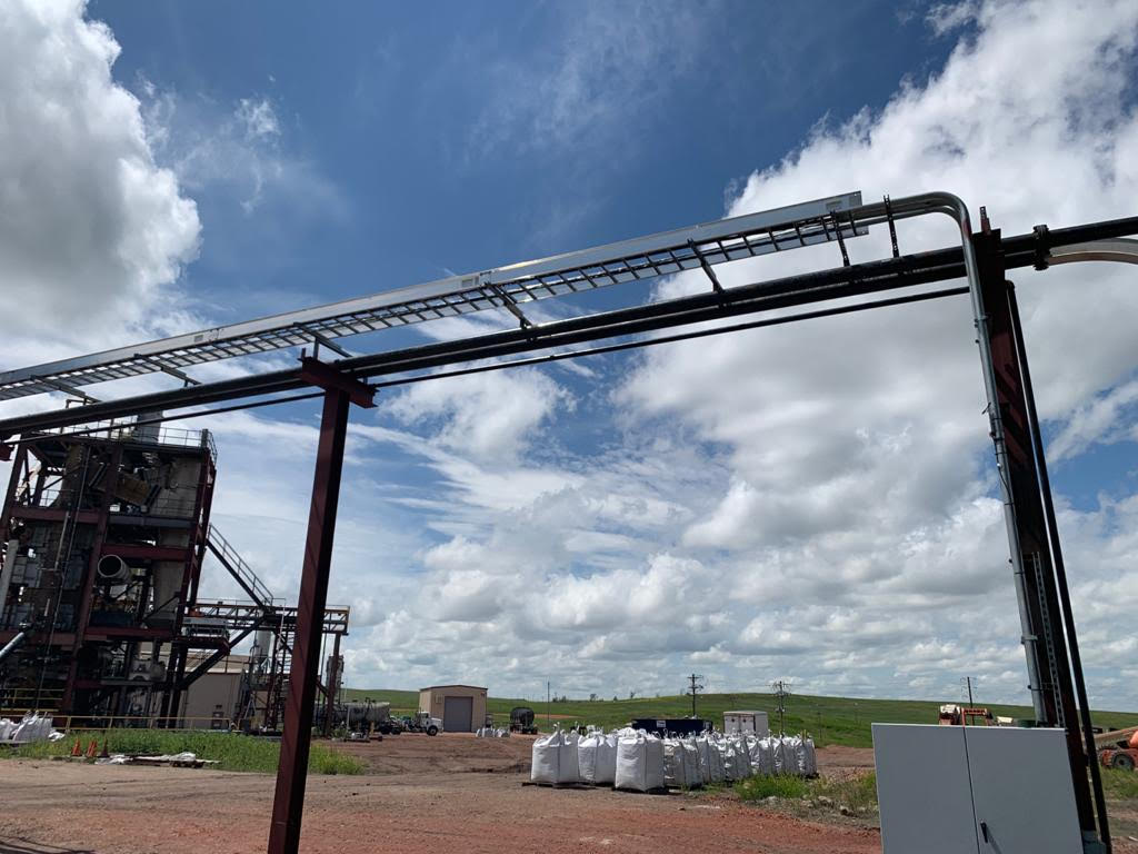 A view of an industrial area with a sky background