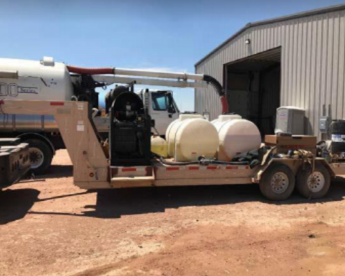 A truck with two large tanks on it